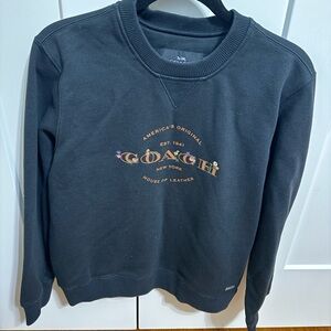Coach woman’s black crewneck sweatshirt